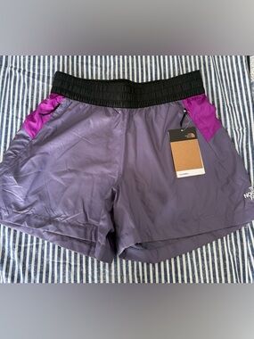 The North Face Women's Purple Athletic Shorts with Pink Paneling